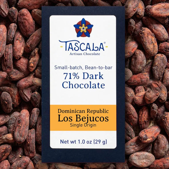 Product photo of a Tascala 71% Dominican Republic Bejucos dark chocolate bar package with background of cocoa beans